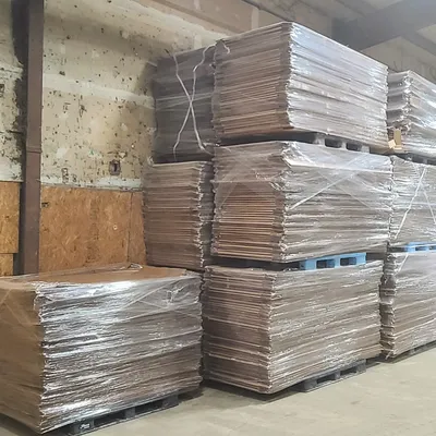Compressed cardboard for recycling pickup