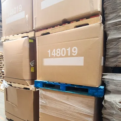 Bundled cardboard material for processing
