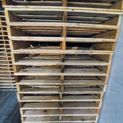 Rows of reconditioned wood pallets