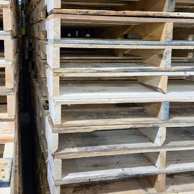 Wood pallet stacks at the warehouse